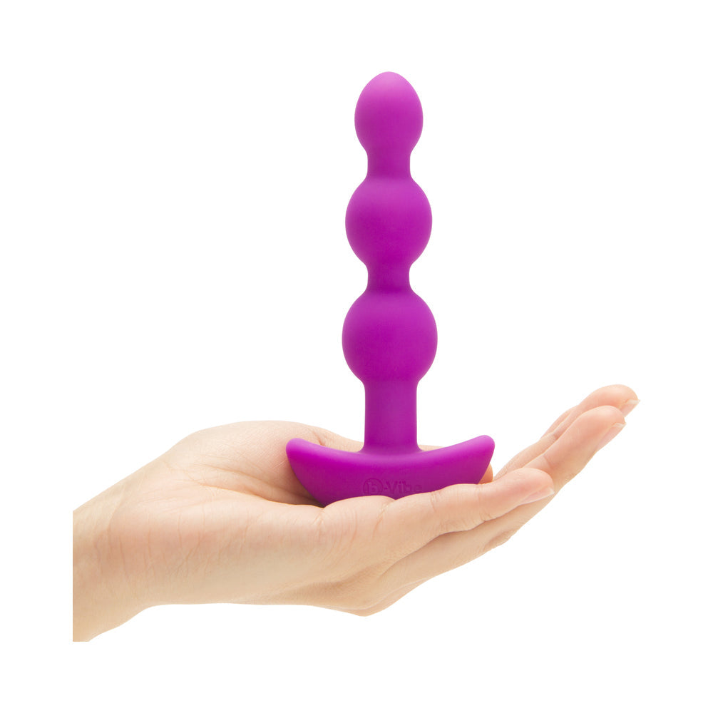 b-Vibe Triplet Rechargeable Remote-Controlled Vibrating Anal Beads – Fuchsia