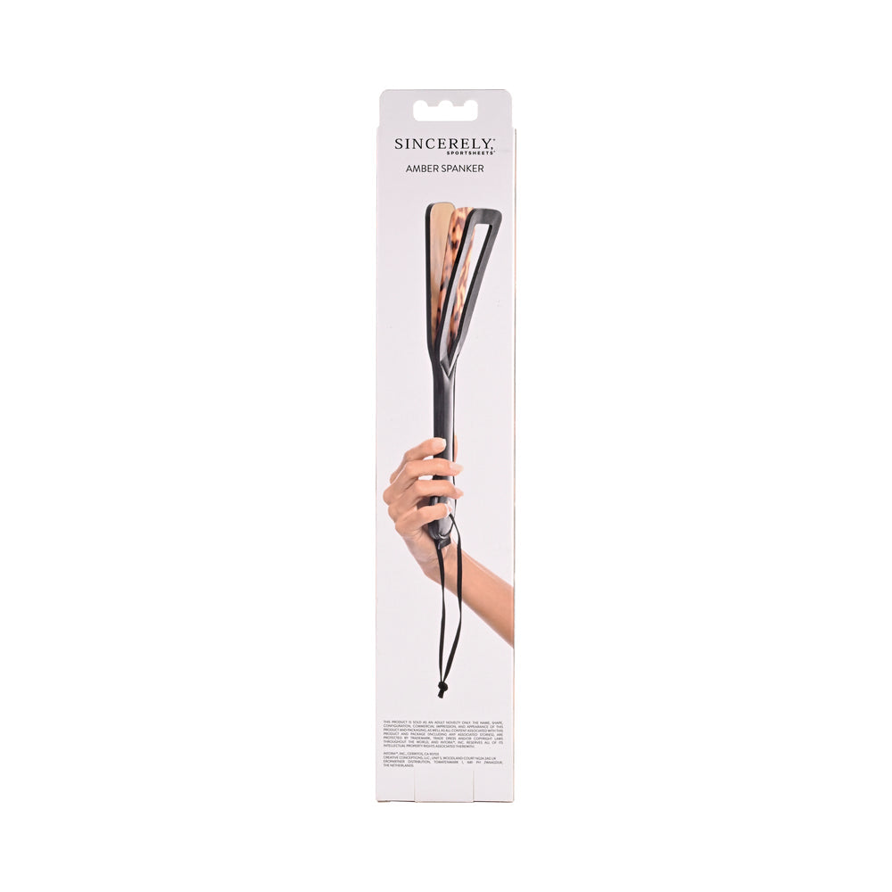 Sportsheets Amber Layered Spanker with Rawhide Leash – Tortoiseshell
